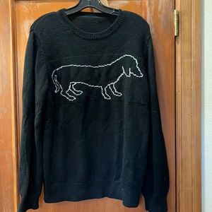 100% Merlino Wool black sweater with white dachshund outline. Sz large. Nice.